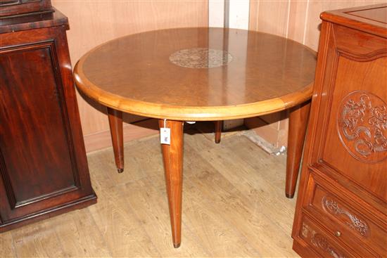 A circular burr walnut marble inset dining table, Diameter 120cm